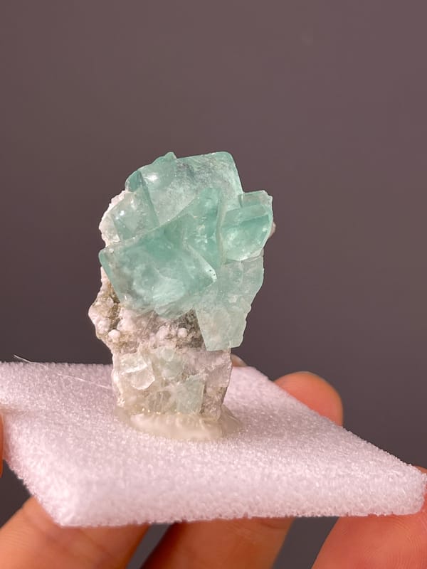 Aqua Blue-Green Fluorite specimen from Yaogangxian Mine, Hunan, China, characterized by mint-green intergrown cubes