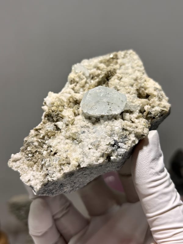 Feldspar-mica plate with pale aquamarine from Xuebaoding, Sichuan, China, second angle