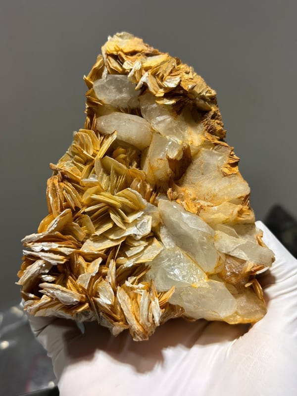Golden mica plate with aquamarine and scheelite from Xuebaoding, Sichuan, China