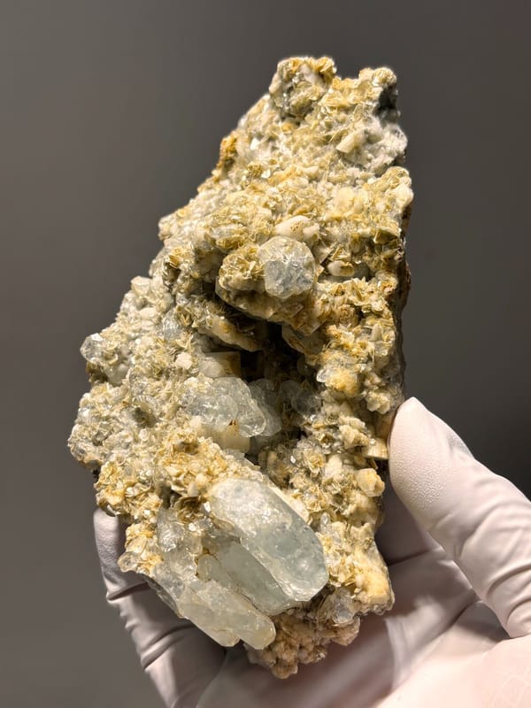 Mica plate with many aquamarine crystals from Xuebaoding, Sichuan, China, second angle