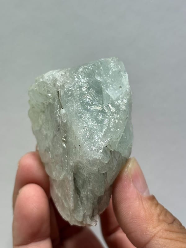 Single aquamarine crystal with unusual green tint from Xuebaoding, Sichuan, China, view 4 of 5