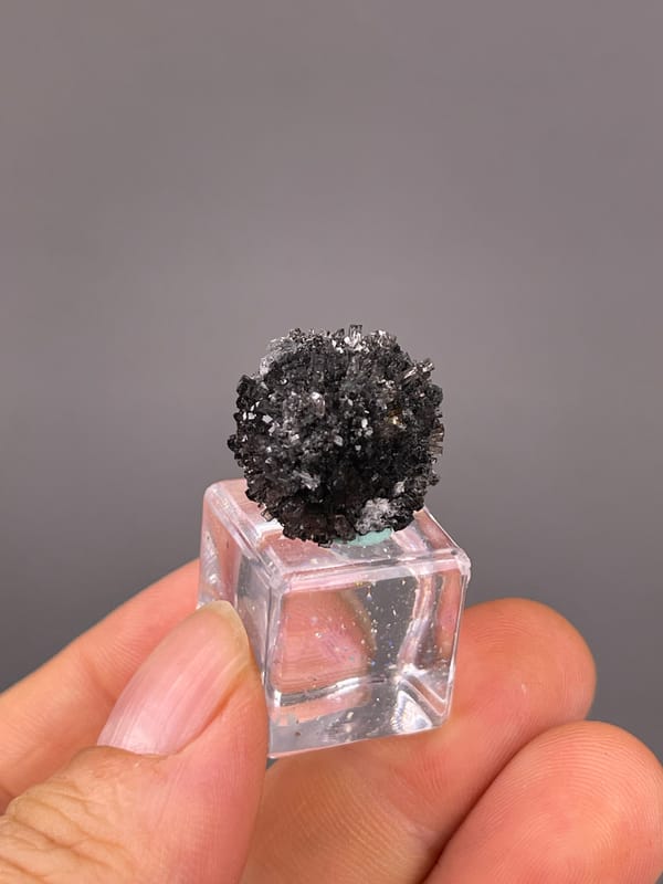 Aurora Calcite specimen from Longyan, Fujian, China showing black spherical radiating aggregate