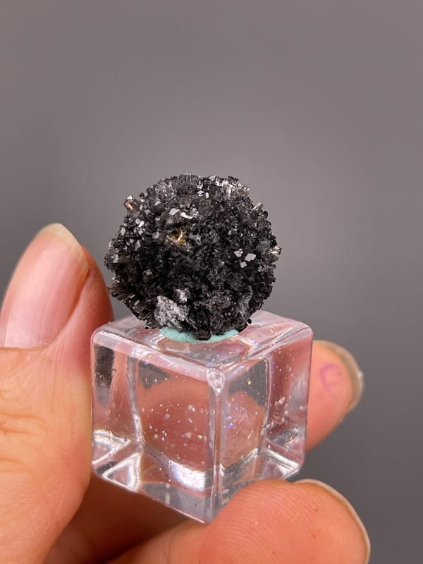 Aurora Calcite specimen from Longyan, Fujian, China, characterized by black spherical radiating aggregate