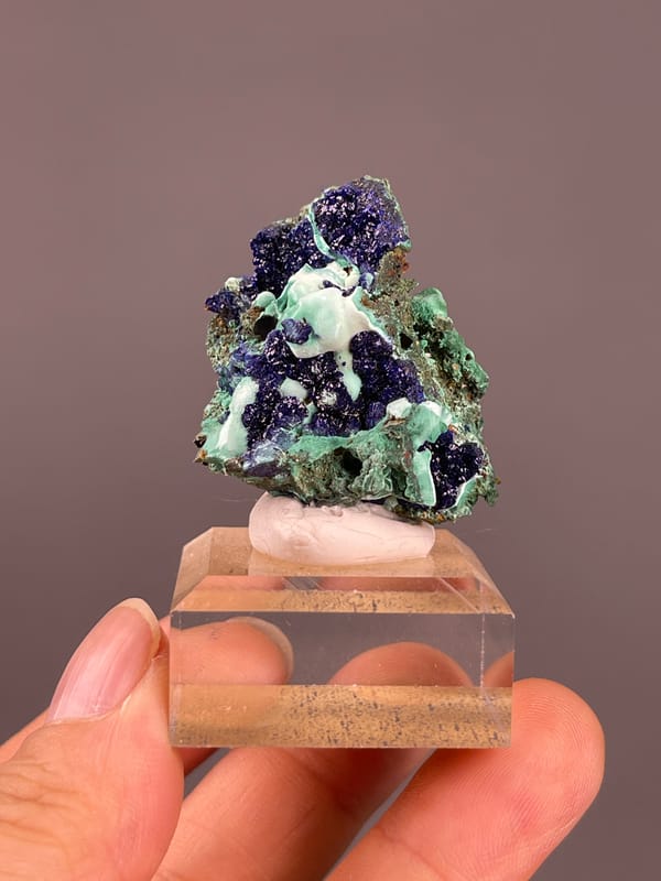 Azurite from Anhui, China: deep blue rounded crystals in pale green malachite.