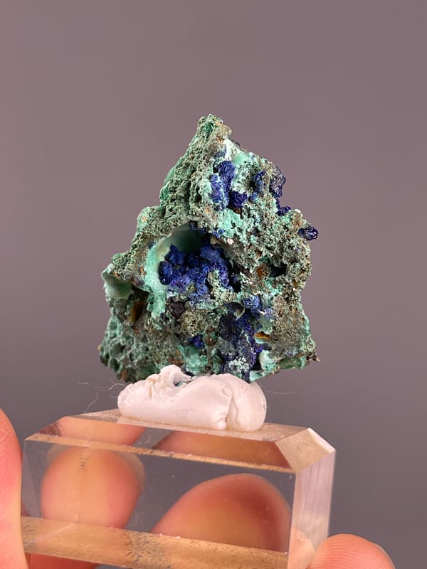 Azurite from Anhui, China: reverse green surface with a blue cavity.