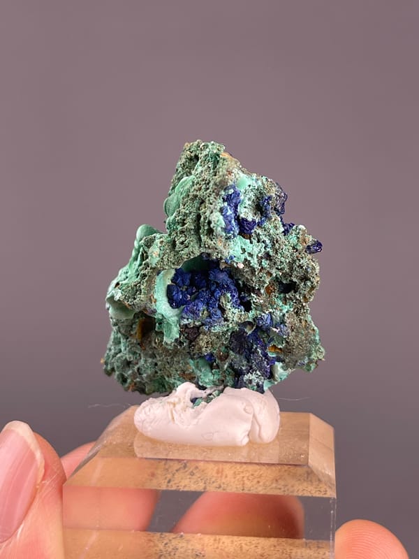 Azurite from Anhui, China: back view of rough green matrix and blue crystals.