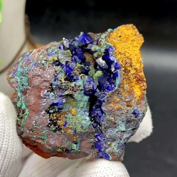 Deep blue azurite crystals with malachite and orange limonite from Anhui, China