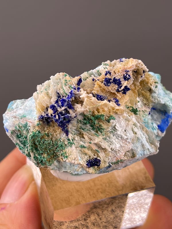 Azurite specimen from Qinglong, Guizhou, China displaying blue azurite and green malachite on white blades