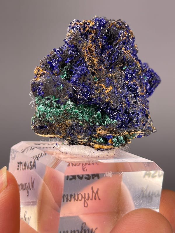 Royal-blue crystals with green patches on natural azurite specimen from Myanmar