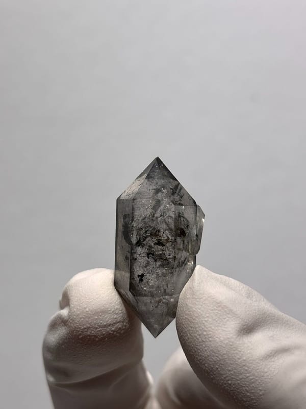 Stout black-flecked double-terminated quartz with side crystal from Yunnan, China, view 2 of 8