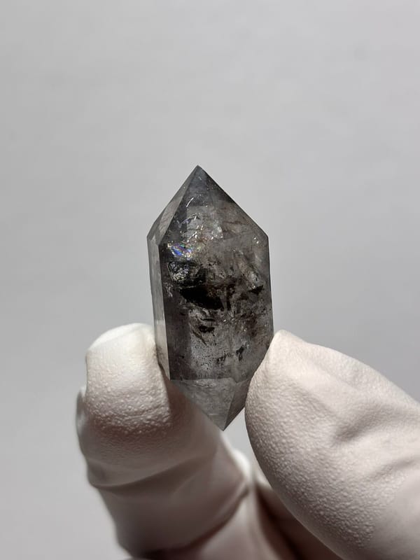 Stout black-flecked double-terminated quartz with side crystal from Yunnan, China, view 3 of 8