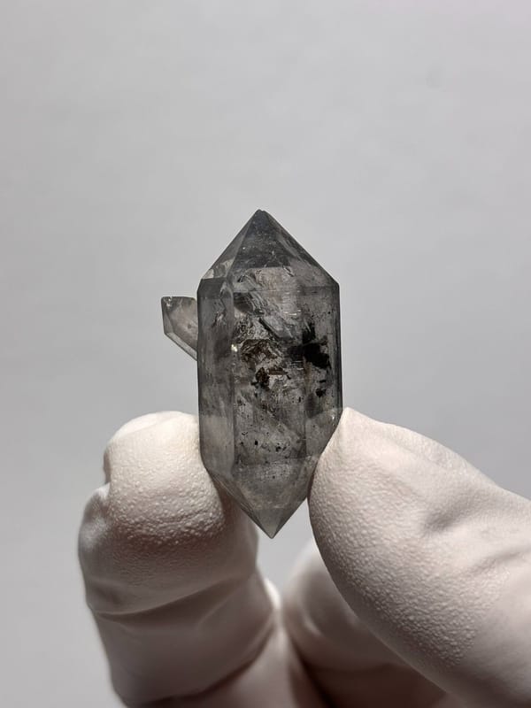 Stout black-flecked double-terminated quartz with side crystal from Yunnan, China, view 4 of 8