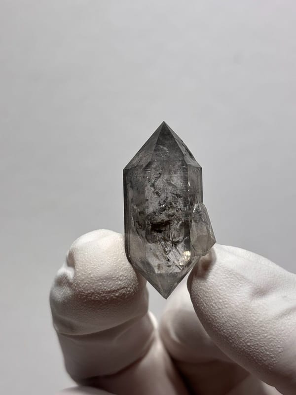 Stout black-flecked double-terminated quartz with side crystal from Yunnan, China, view 6 of 8
