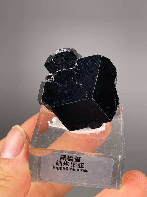 Black Tourmaline specimen from Namibia featuring black striated prismatic crystals