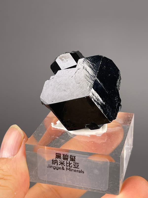 Black Tourmaline specimen from Namibia showing black striated prismatic crystals