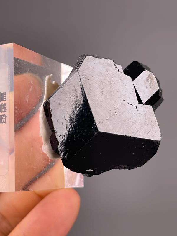Black Tourmaline specimen from Namibia, characterized by black striated prismatic crystals