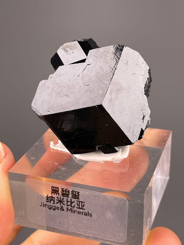 Black Tourmaline specimen from Namibia bearing black striated prismatic crystals