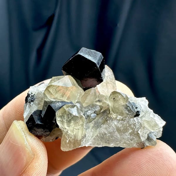 Black tourmaline crystal on pale smoky quartz from Namibia