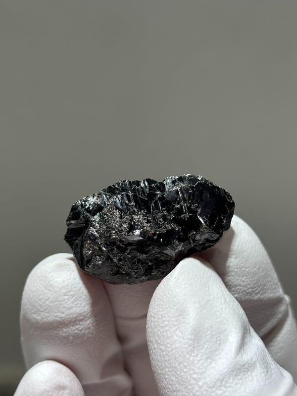 Bladed black cassiterite crystal from Xuebaoding, Sichuan, China, view 2 of 5