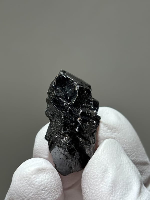 Bladed black cassiterite crystal from Xuebaoding, Sichuan, China, view 4 of 5
