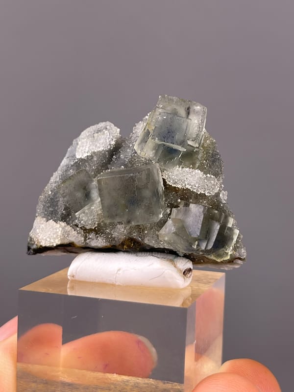 Blue-core Fluorite specimen from Sanming, Fujian, China, defined by gray-green cubes with white quartz