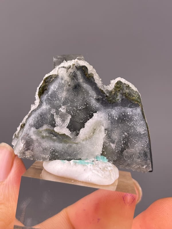 Gray-green cubes with white quartz visible on blue-core fluorite specimen from Sanming, Fujian, China