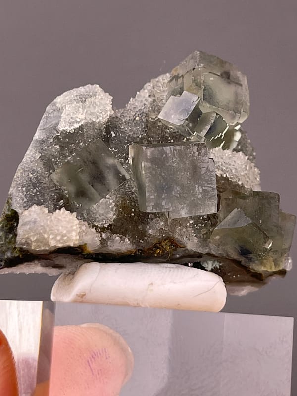 Gray-green cubes with white quartz on natural blue-core fluorite specimen from Sanming, Fujian, China