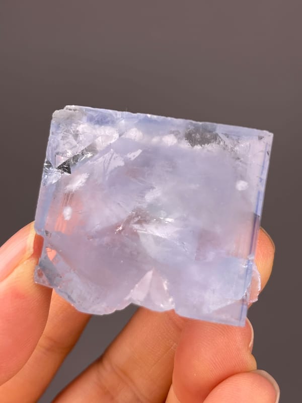 Blue Fluorite specimen presenting pale-blue cleavage-modified faces clearly