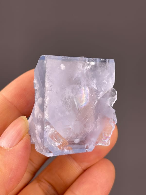 Pale-blue cleavage-modified faces seen across this blue fluorite specimen