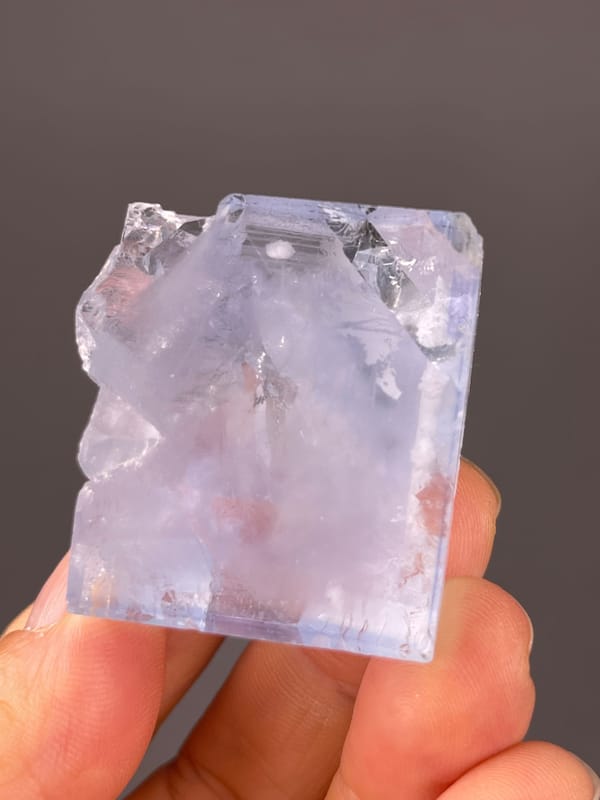 Blue Fluorite specimen characterized by pale-blue cleavage-modified faces visibly