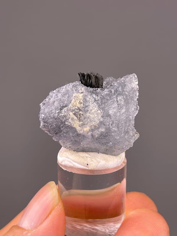 Blue Fluorite specimen from Yaogangxian Mine, Hunan, China featuring pale lilac fluorite with black blades