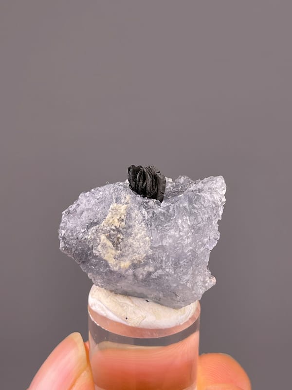 Blue Fluorite specimen from Yaogangxian Mine, Hunan, China showing pale lilac fluorite with black blades