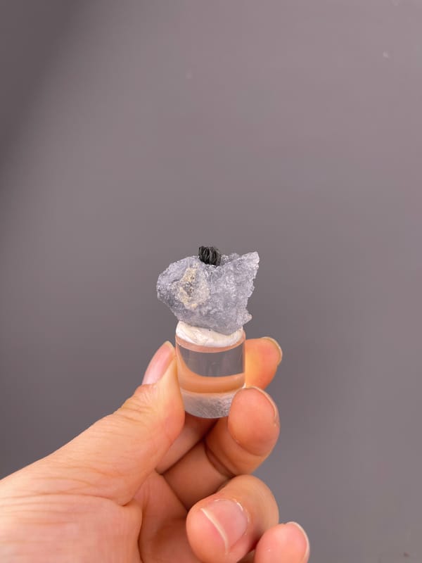 Blue Fluorite specimen from Yaogangxian Mine, Hunan, China, characterized by pale lilac fluorite with black blades
