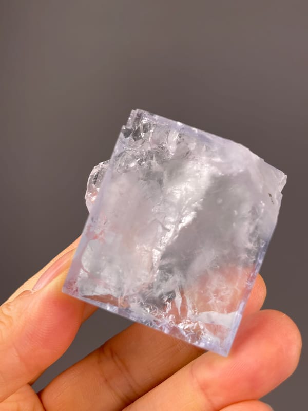 Clear cubic cleavage faces on natural blue fluorite specimen from Zhejiang, China