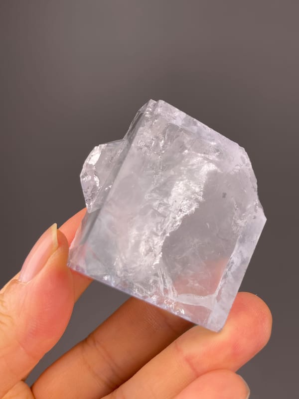 Blue Fluorite specimen from Zhejiang, China highlighting clear cubic cleavage faces