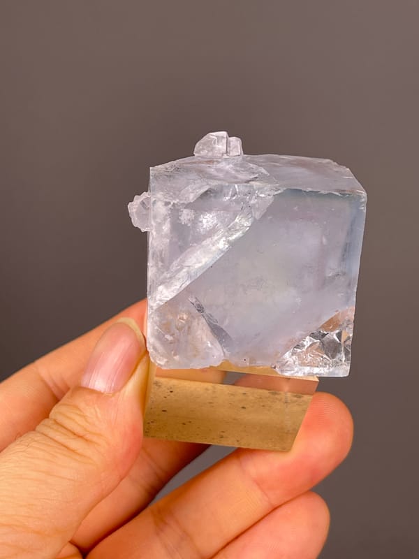 Blue Fluorite specimen from Xianghualing, Hunan, China highlighting pale lavender cubic block
