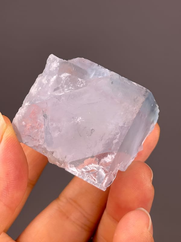 Blue Fluorite specimen from Xianghualing, Hunan, China bearing pale lavender cubic block