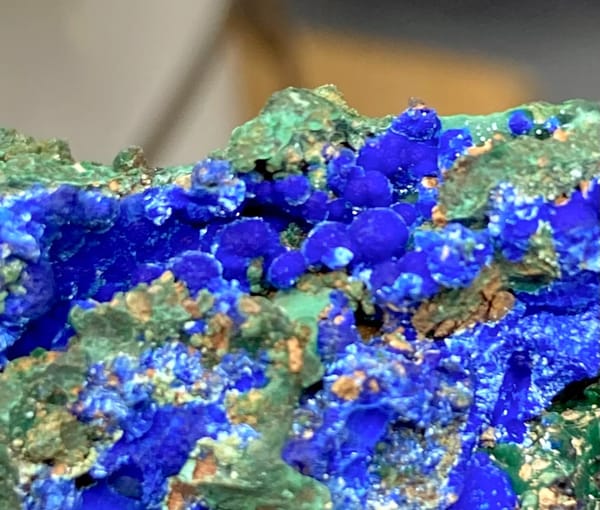 Green malachite crust with deep blue azurite balls from Anhui, China, view 4 of 9