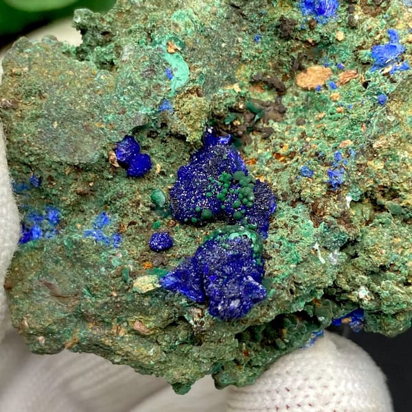 Green malachite crust with deep blue azurite balls from Anhui, China, view 8 of 9