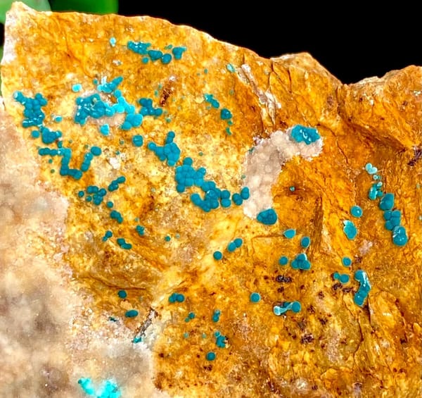 Orange block with green botryoidal malachite and blue copper spots from Yunnan, China, view 4 of 9