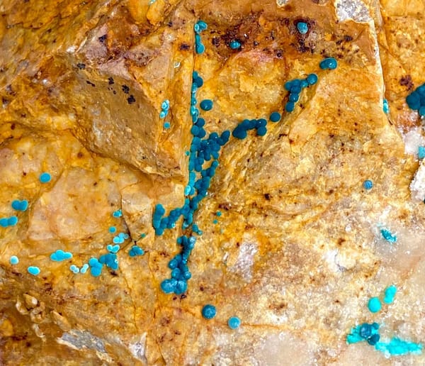 Orange block with green botryoidal malachite and blue copper spots from Yunnan, China, view 6 of 9