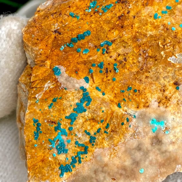 Orange block with green botryoidal malachite and blue copper spots from Yunnan, China, view 8 of 9