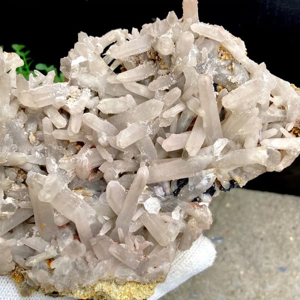 Plate of pale quartz prisms over botryoidal hematite from Inner Mongolia, China, view 3 of 9