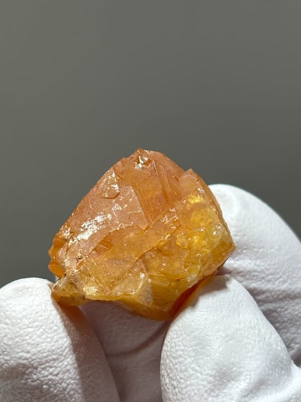 Bright orange scheelite crystal from Xuebaoding, Sichuan, China