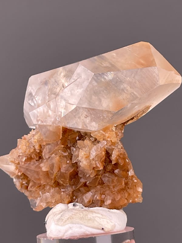 Calcite specimen from Daye, Hubei, China bearing clear prismatic crystal on brown matrix