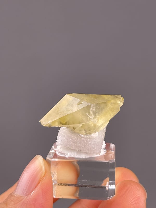 Calcite from Daye, Hubei, China: oblique view of the flattened yellow crystal.