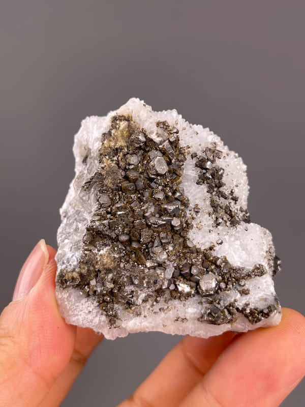 Calcite from Fujian, China: brown calcite crystals surrounded by white quartz.