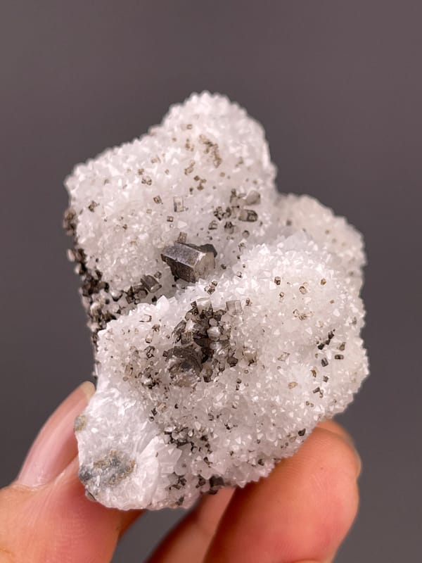 Calcite from Fujian, China: upright view of contrasting brown and white growths.