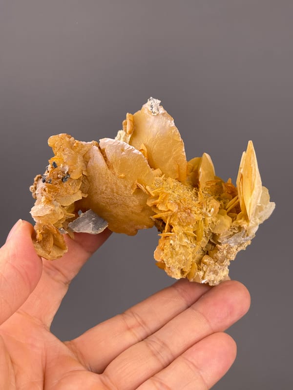 Calcite from Guangdong, China: ochre plates with open spaces between them.