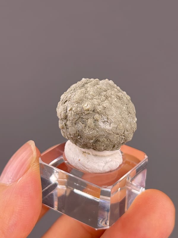 Calcite from Huanggangliang, Inner Mongolia, China: reverse side with irregular folded surface texture.